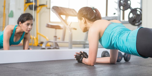 habits woman exercising plank None