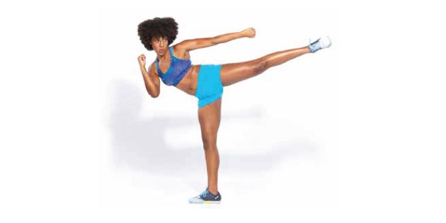 2 roundhouse kick Woman boxing in roundhouse kick stance