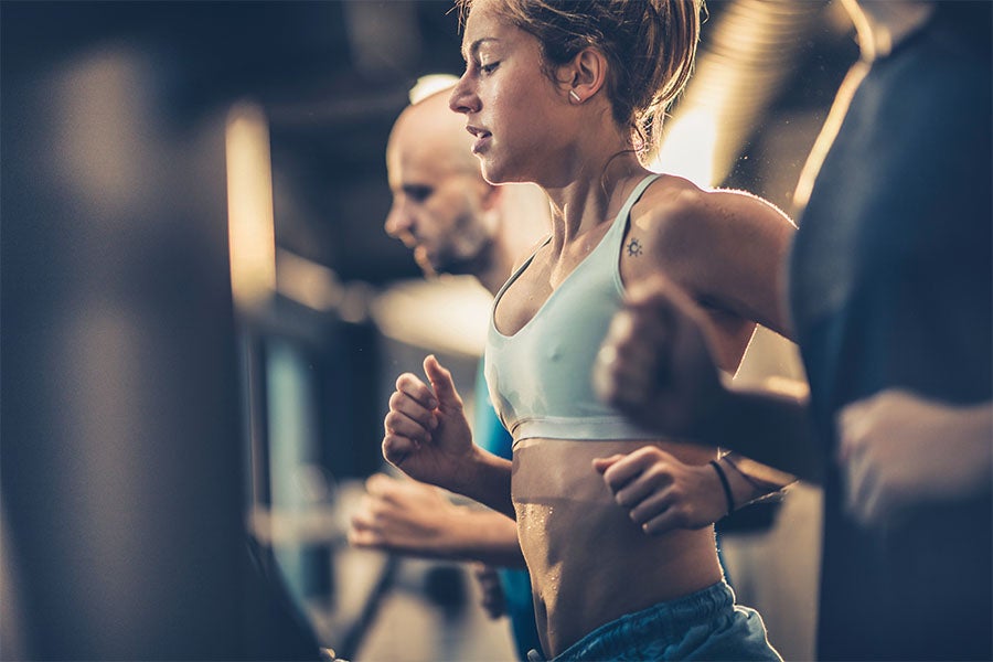 Maximize promo Woman Running on the Treadmill