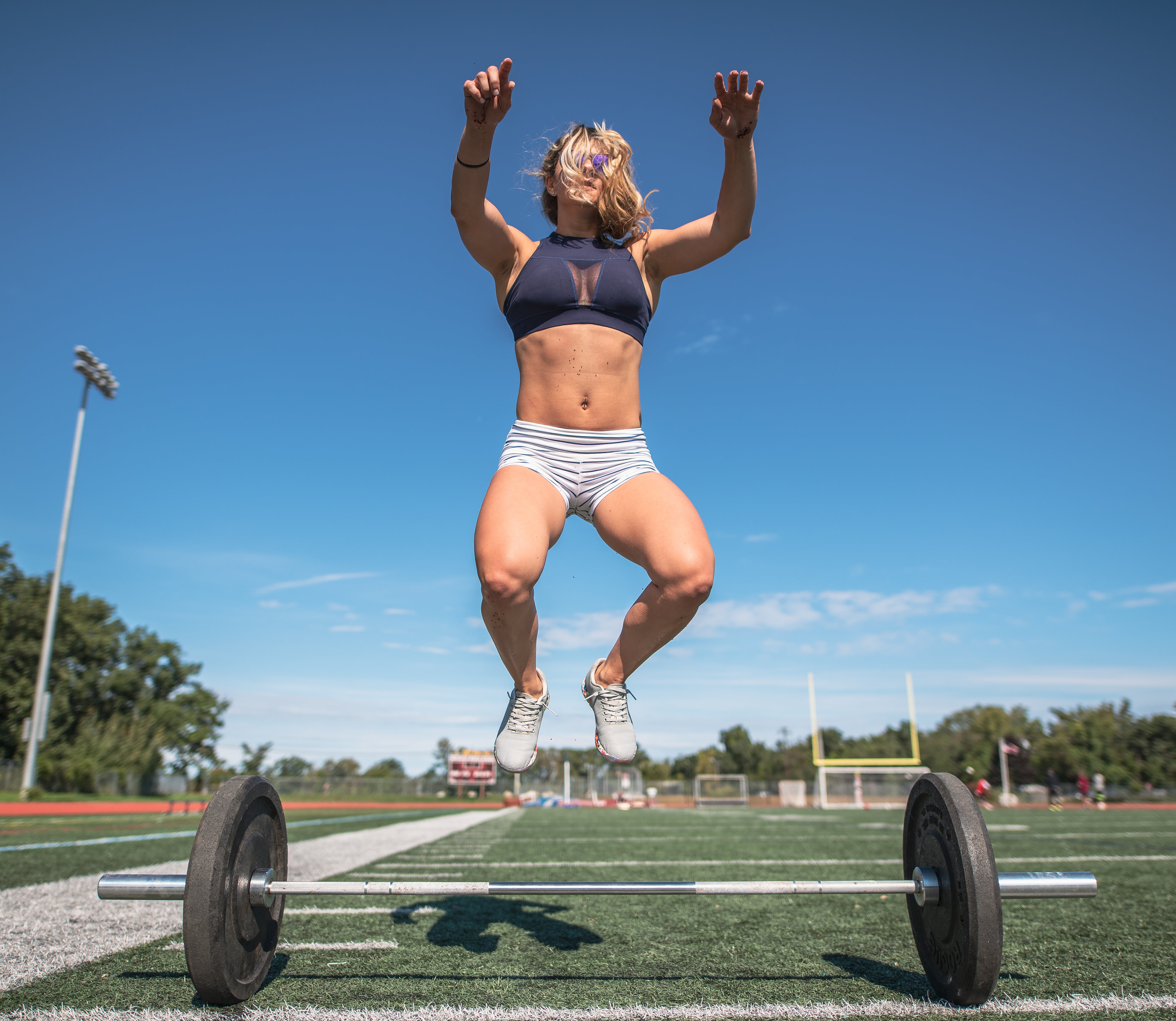 RX8_8438 fit athlete outdoors doing burpee