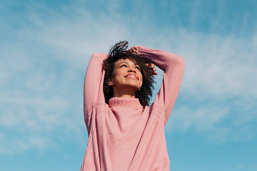 Stress Management Young woman outdoors smiling