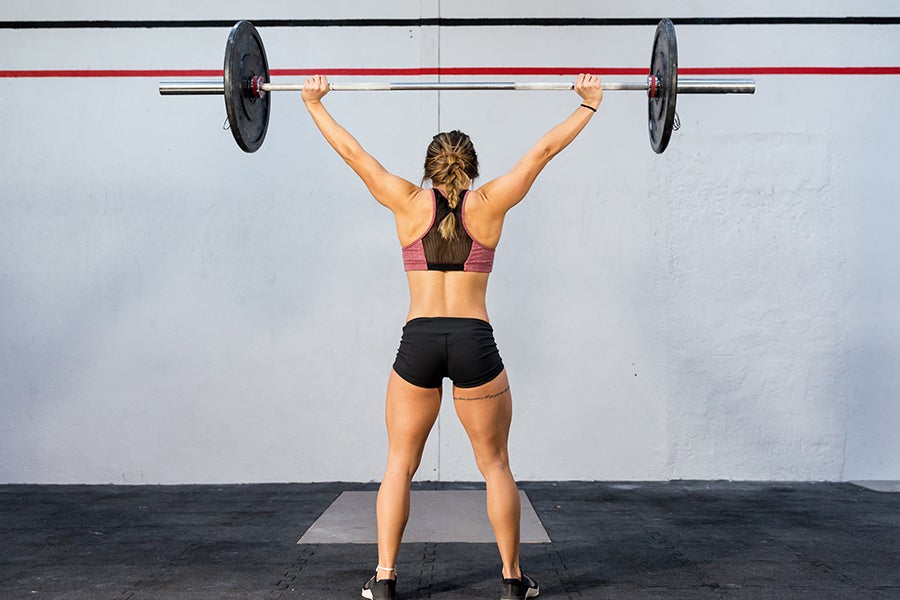 Stress and Training Crossover Woman weightlifting
