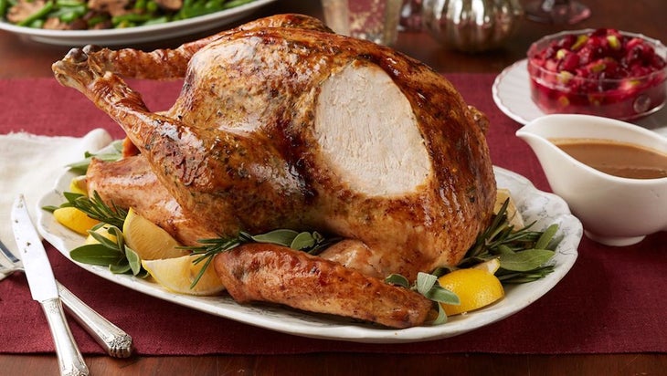 Rosemary-lemon-rubbed turkey with caramalized onion and garlic gravy.pic_preview None