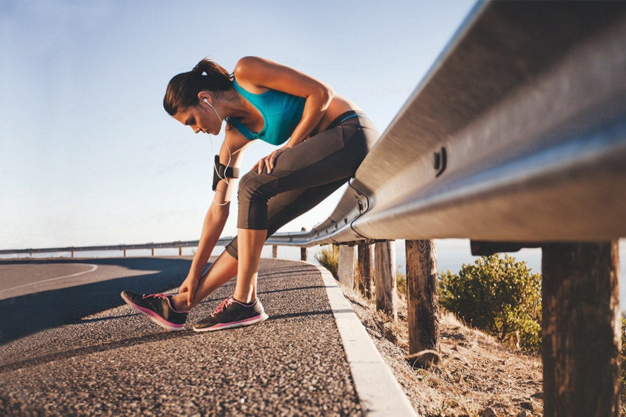 Woman exercising outdoors ankle injury