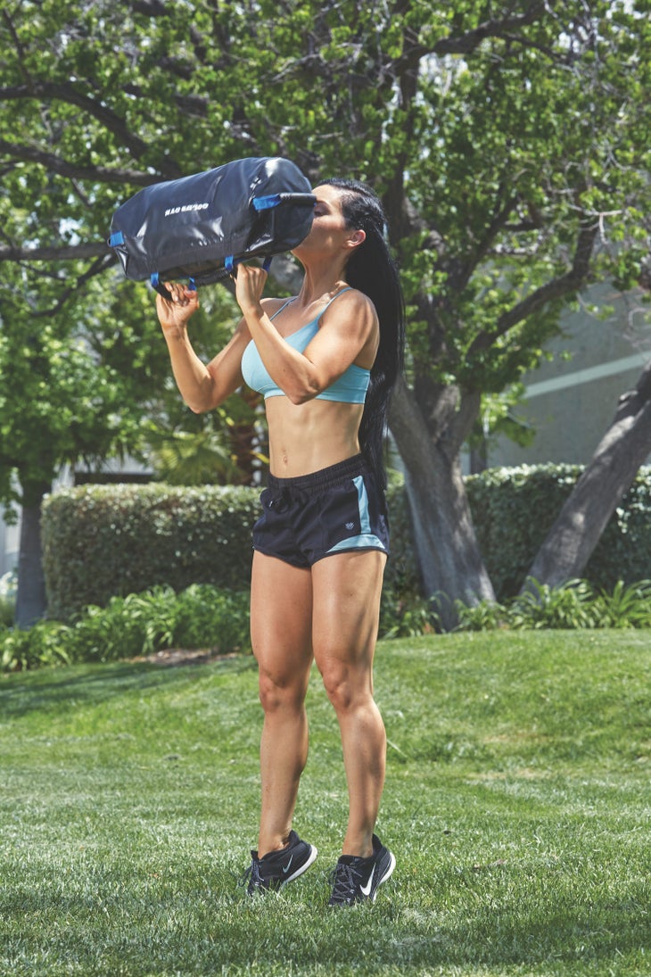 roratational snatch 3 Rotational Lunge Snatch with Sandbag