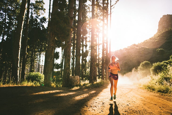 Promo Image Woman running in the woods