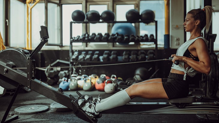 Woman Doing Rowing Machine Workout