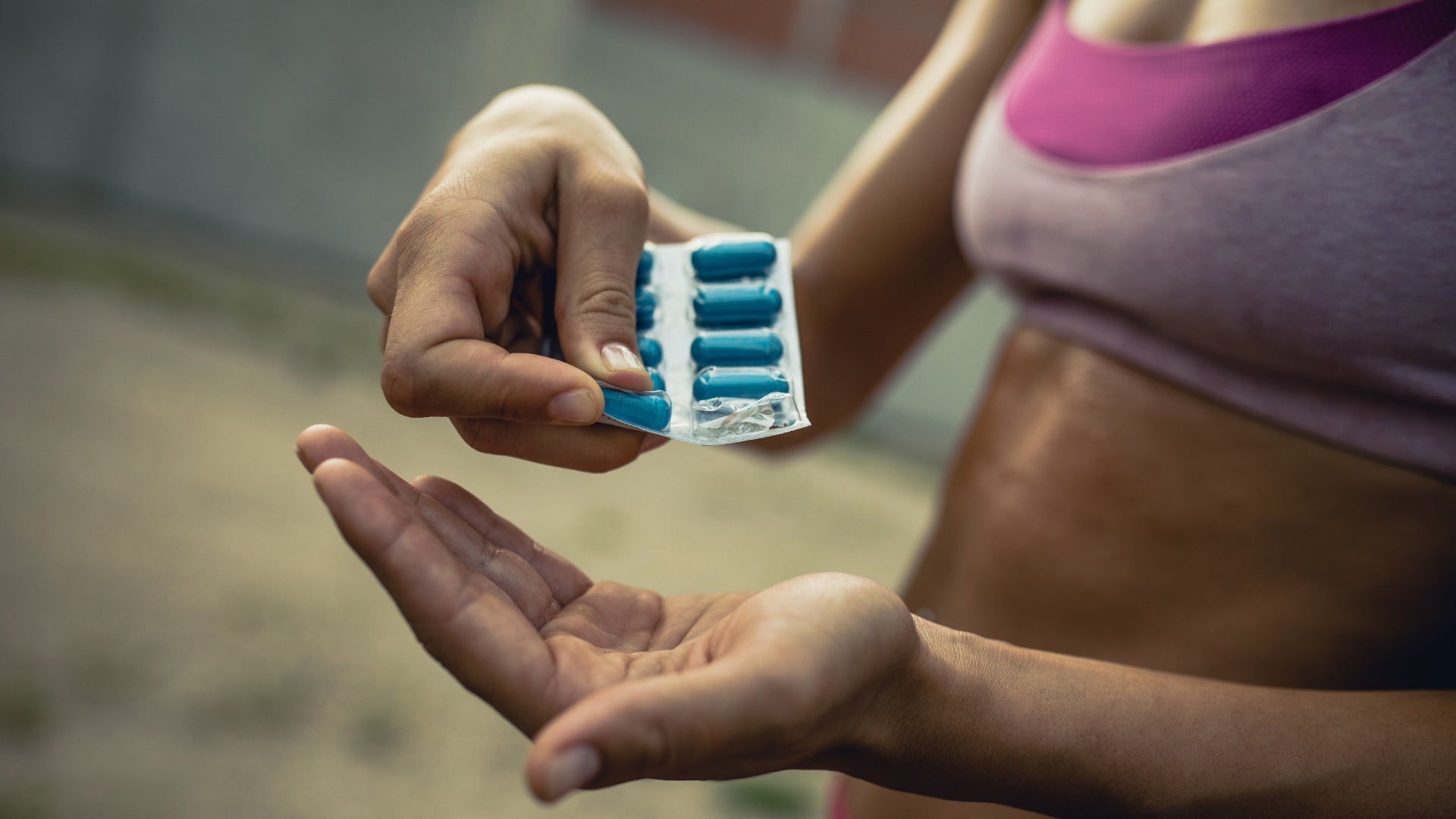Woman Taking Supplements