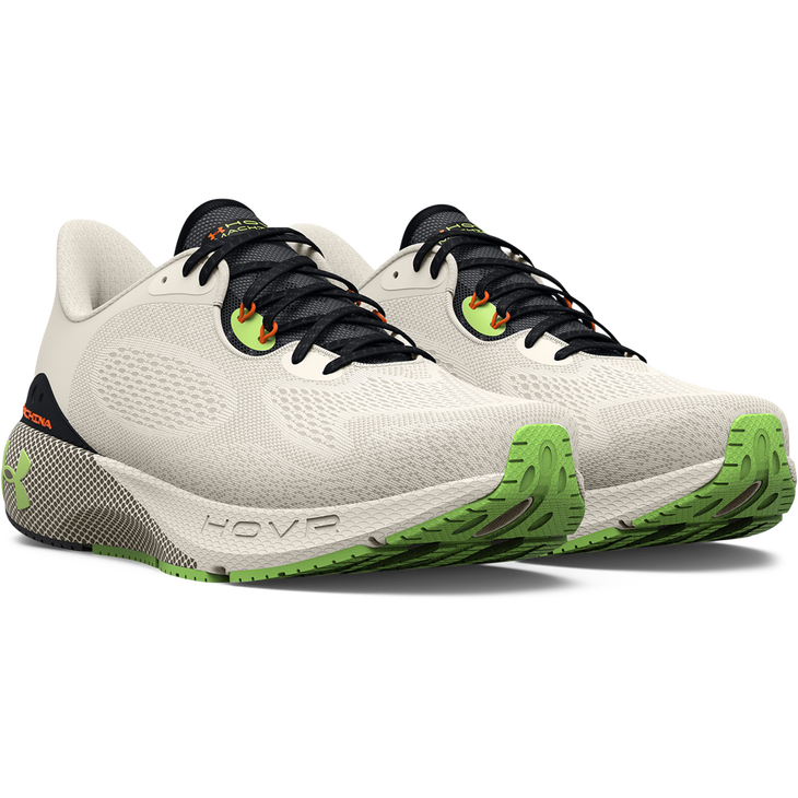 A pair of Under Armour running shoes in green and white