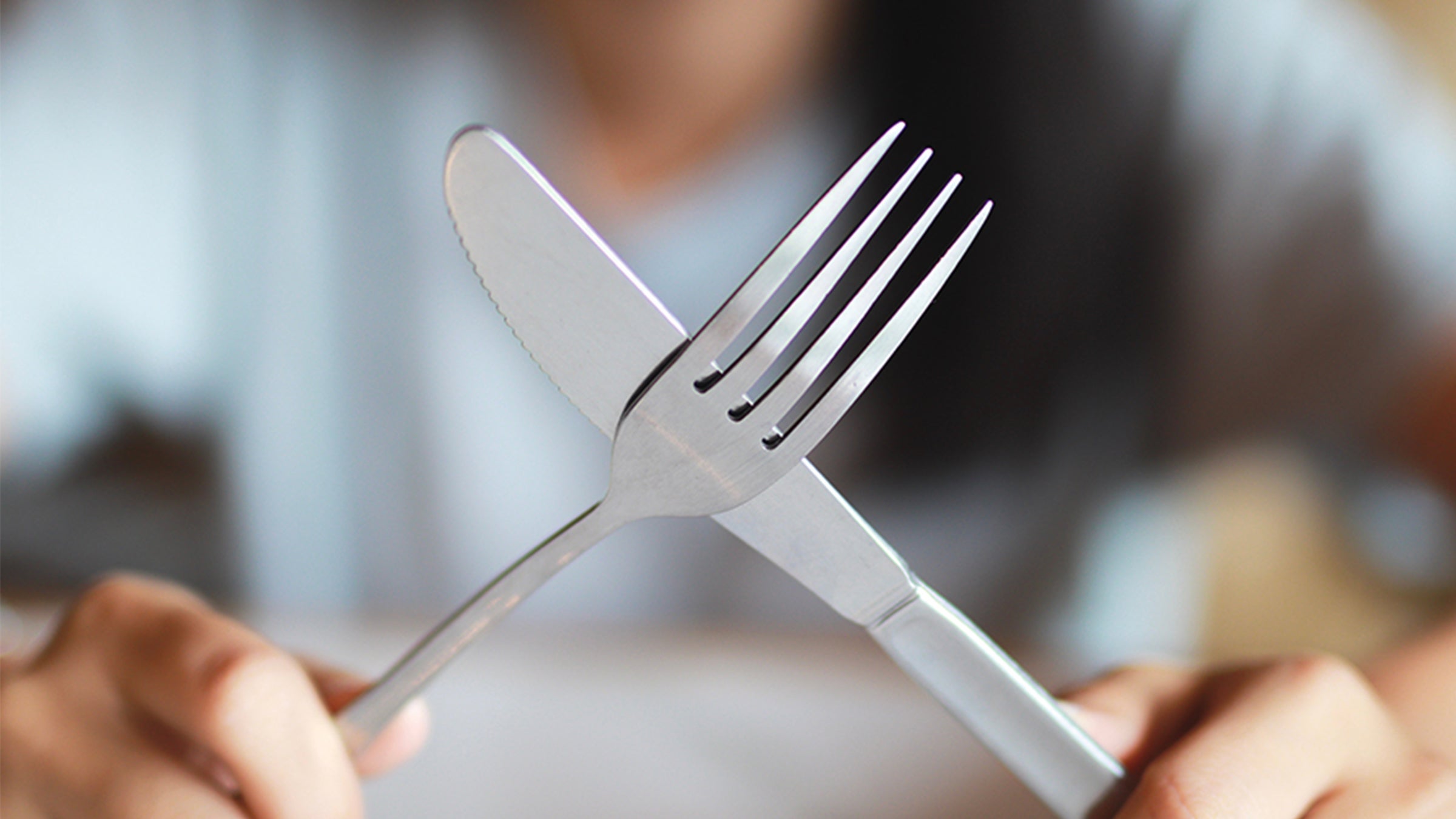 Fork and knife crossed